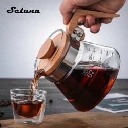  A glass server to drip and serve coffee with a   600ml wooden cover